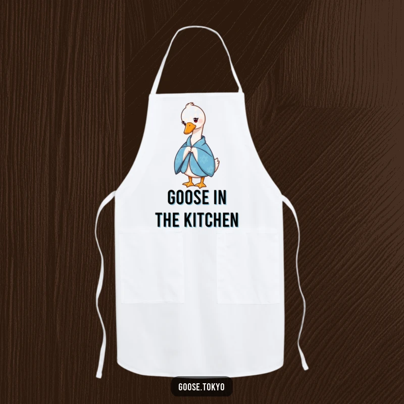 Funny apron showcasing a graceful goose in a blue patterned kimono, performing a slight bow, perfect for kitchen or crafting.