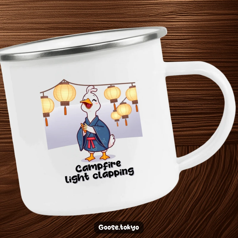 Funny goose camping mug showing a joyful goose in a blue kimono clapping near illuminated paper lanterns, a durable and humorous cup.