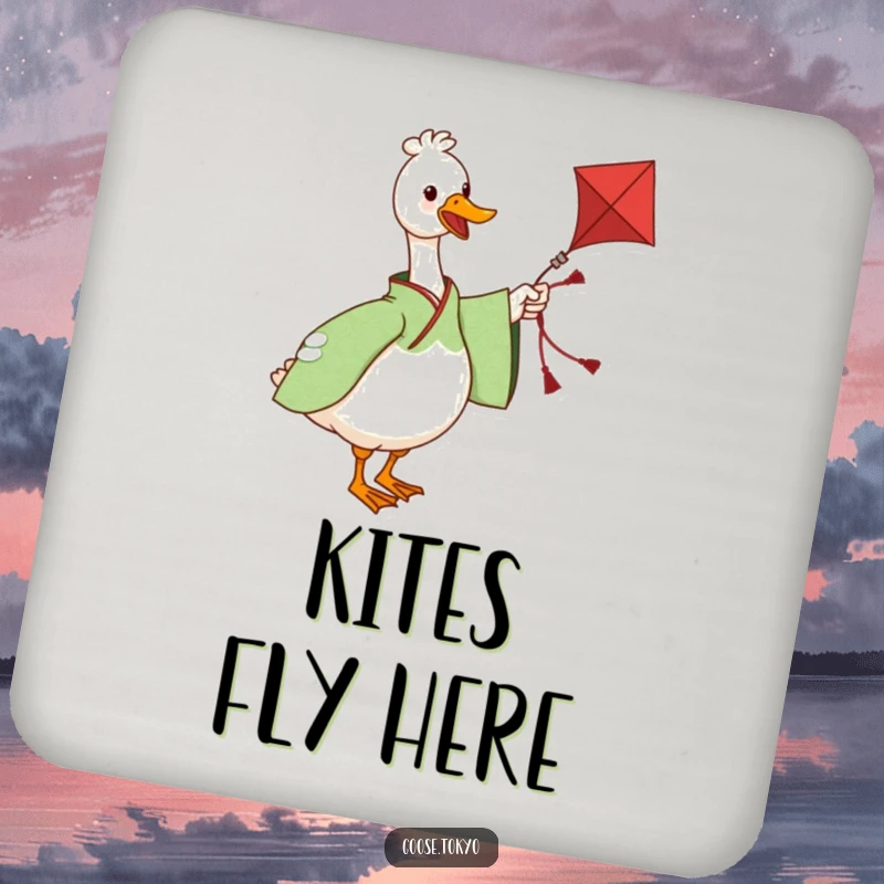 Funny coaster with a charming goose in a green patterned kimono twirling a kite, offering protection and playful humor to tabletops.