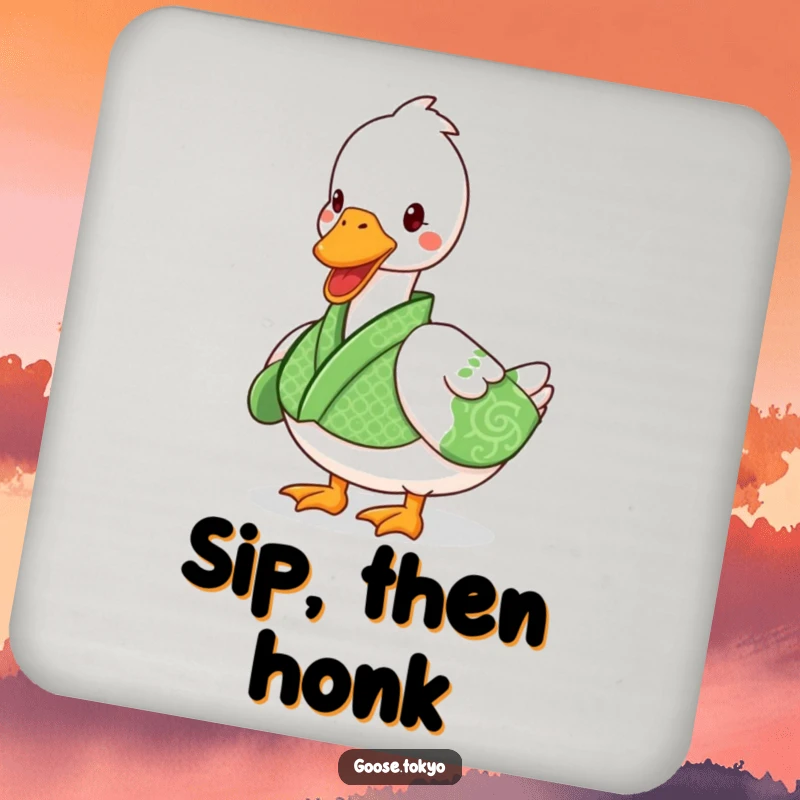 Funny goose drink coaster featuring a playful goose in a green patterned kimono waddling, adding humor to tabletops.