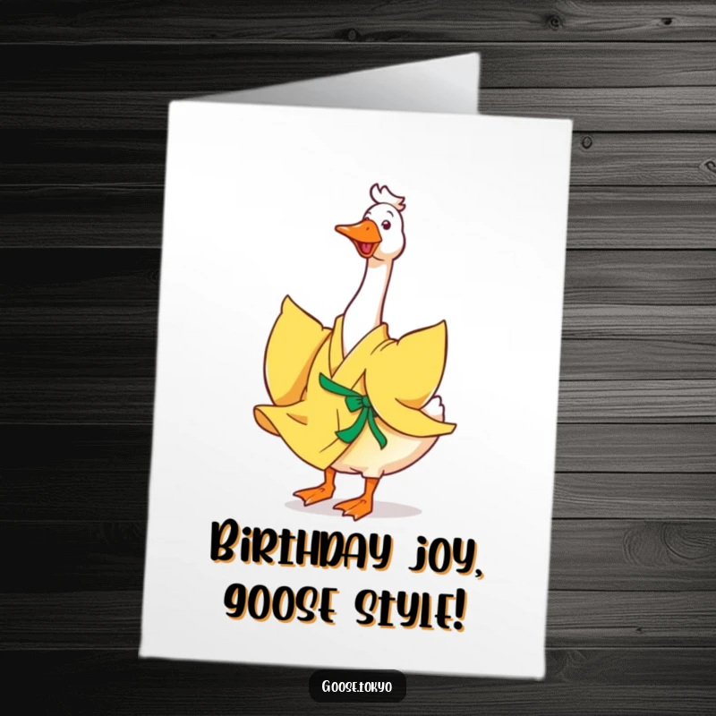 Funny Free Printable Birthday Card: Happy goose in a yellow kimono joyfully twirls, its colorful kimono flowing dynamically around it.