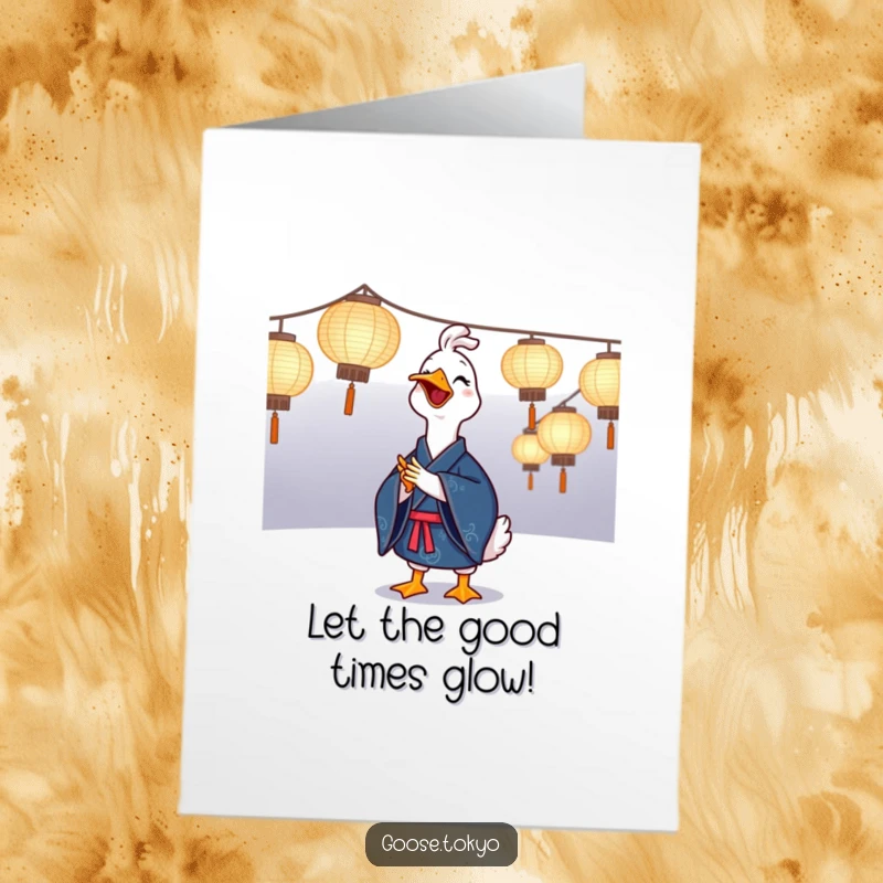 Funny Free Printable Birthday Card: A joyful goose in a blue kimono clapping near illuminated paper lanterns, celebrating a birthday.