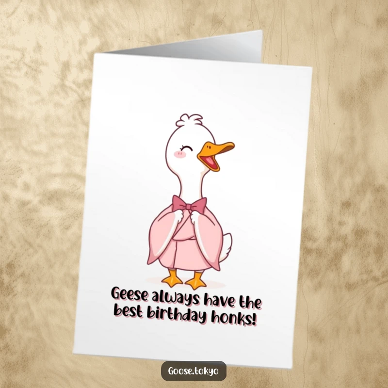 Funny Free Printable Birthday Card: A happy goose in a pink kimono bows gracefully, ready to deliver birthday wishes with style.