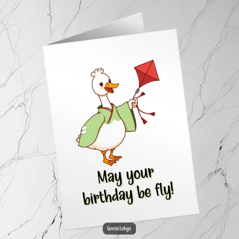 Funny Free Printable Birthday Card: A charming goose in a green kimono twirls a kite, bringing birthday fun.