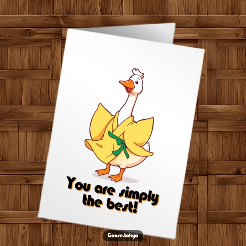 Funny Free Printable Congrats Card: A happy goose in a vibrant yellow kimono twirls with pure joy, its flowing fabric creating a festive motion.