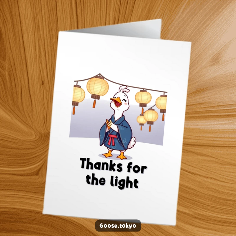 Funny Free Printable Thank You Card: A joyful goose in a blue kimono clapping near bright paper lanterns, conveying heartfelt thanks.